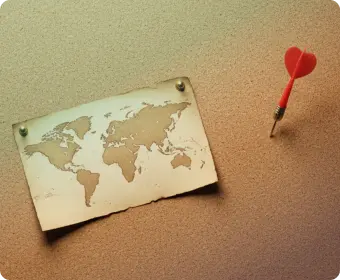 A person holding a world map